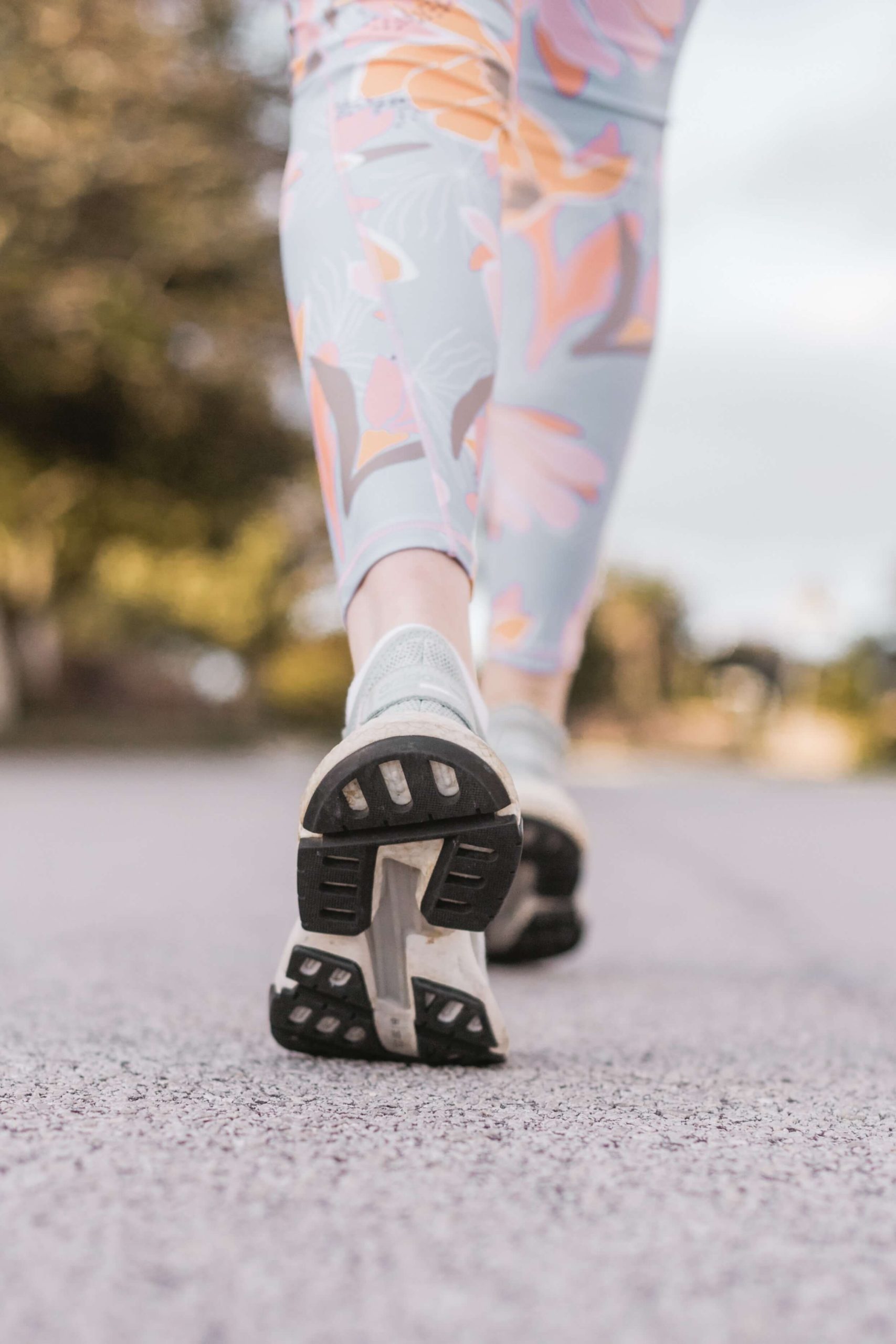 The legs of someone walking.